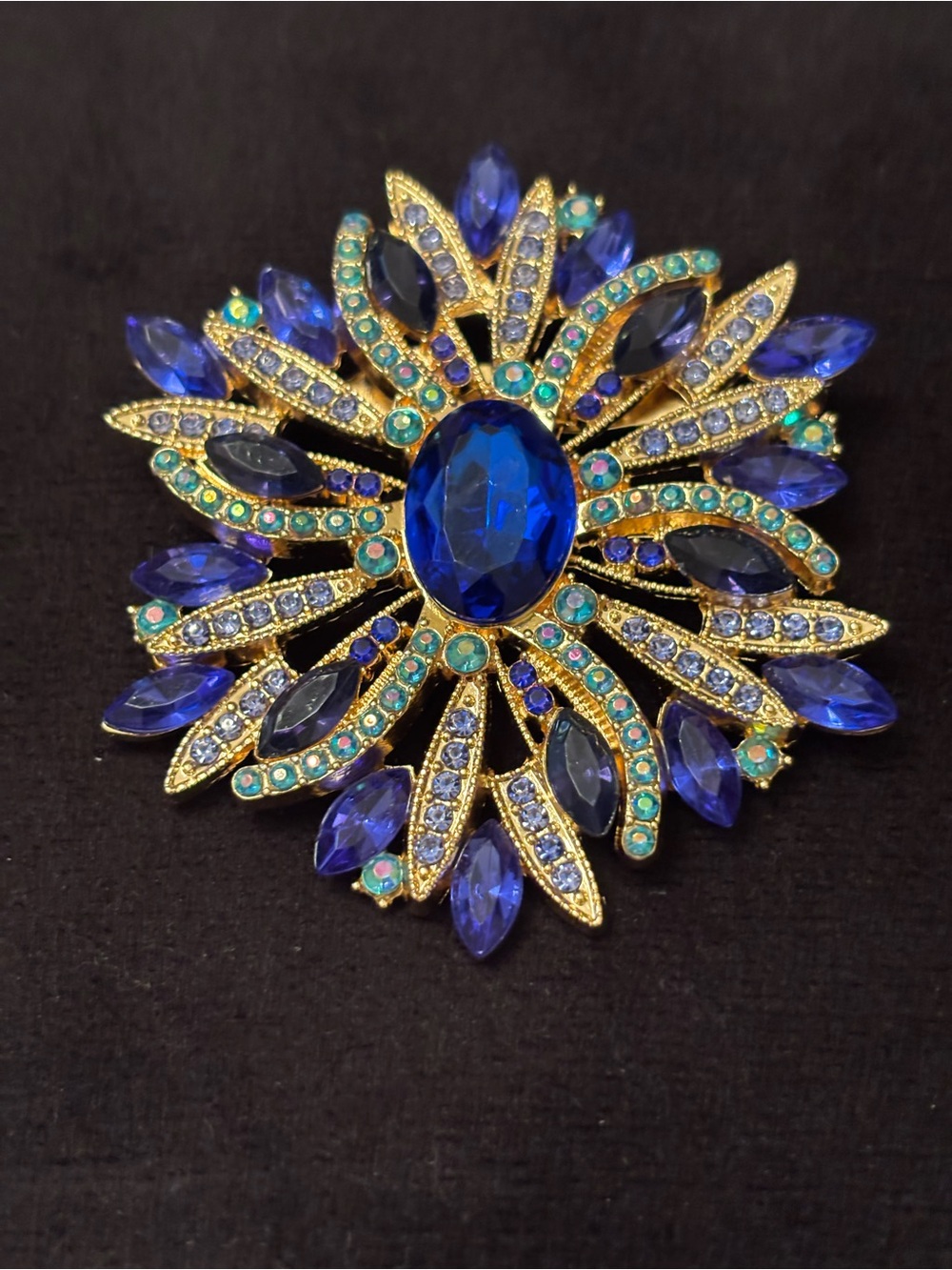 Radiant Gold-Tone Blue and Teal Crystal Floral Brooch